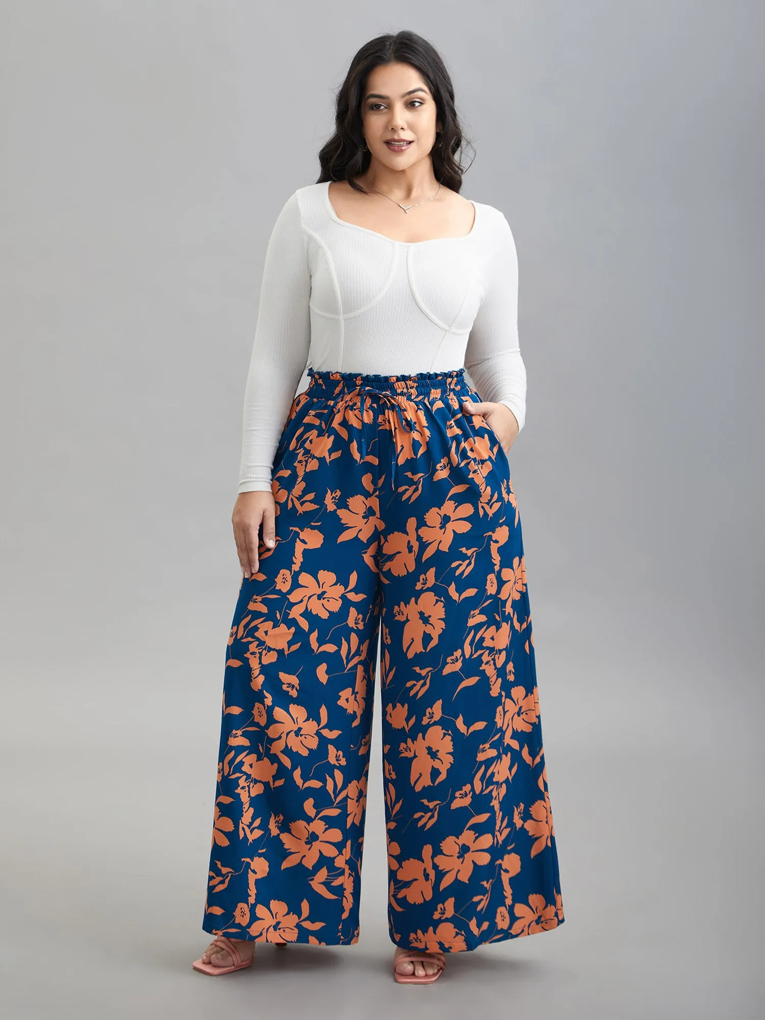 Floral Smocked Waist Flared Leg Pants