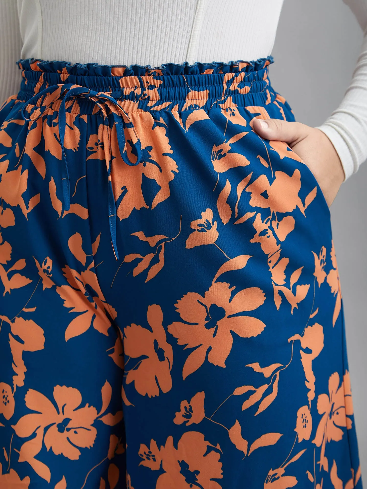 Floral Smocked Waist Flared Leg Pants
